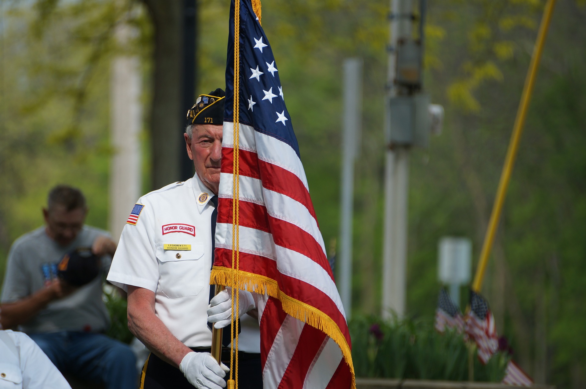 Veteran-holding-flag
